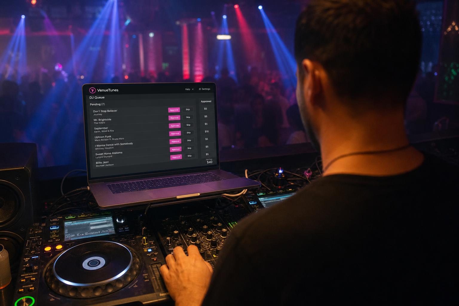 DJ at a Pioneer controller reviewing the live VenueTunes queue on a tablet.